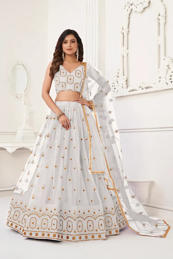 Off White Thread Embroidered Net Lehenga Choli
